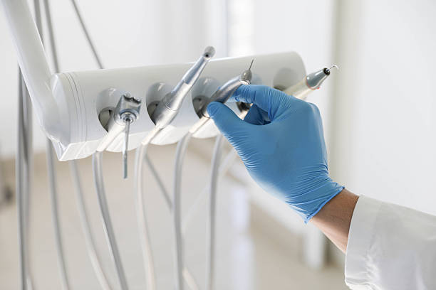Professional Tooth Extraction technician working in Woodbury, NY